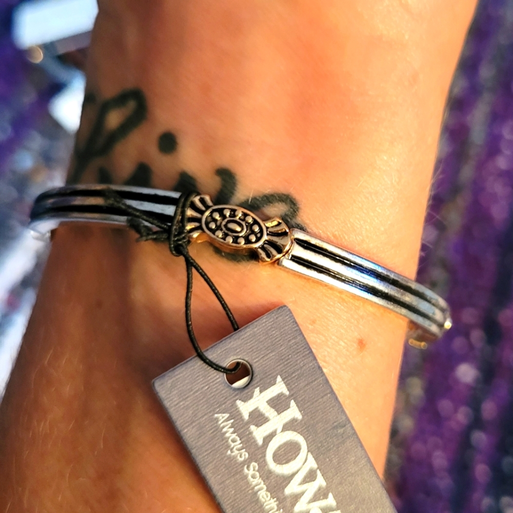 Howards silver and gold tone stretchy bracelet